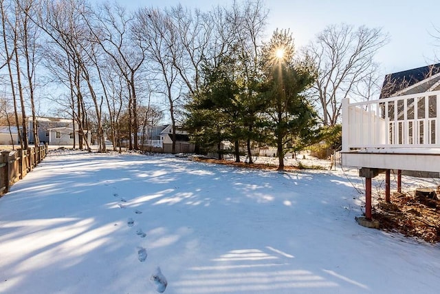 view of yard covered in snow