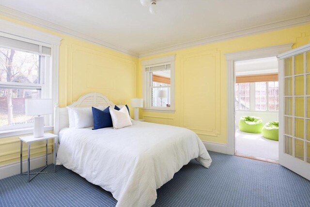 87 Crowninshield Rd, Brookline, MA 02446 - carpeted bedroom featuring crown molding and multiple windows