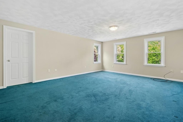 94 Old Right Rd, Ipswich, MA 01938 - carpeted spare room featuring a textured ceiling and baseboards