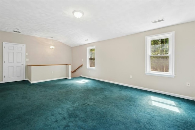 94 Old Right Rd, Ipswich, MA 01938 - empty room with vaulted ceiling and dark carpet