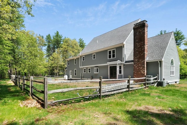 94 Old Right Rd, Ipswich, MA 01938 - rear view of house with a chimney and roof with shingles