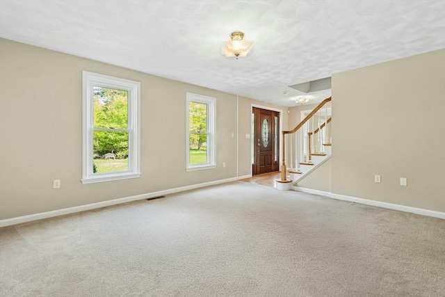94 Old Right Rd, Ipswich, MA 01938 - carpeted entryway with baseboards and stairway
