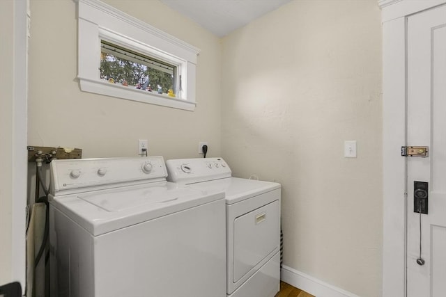 16 Field Rd Unit 16, Arlington, MA 02476 - laundry area featuring washer and dryer and baseboards