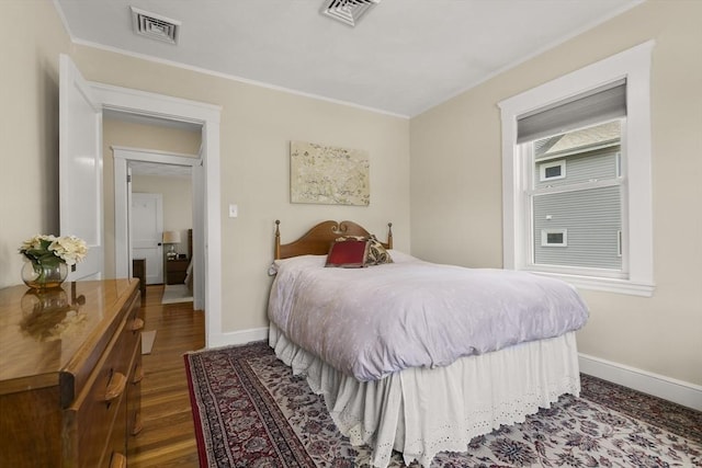16 Field Rd Unit 16, Arlington, MA 02476 - bedroom with wood finished floors and crown molding