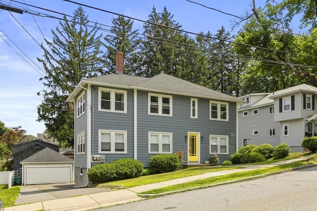 16 Field Rd Unit 16, Arlington, MA 02476 - colonial inspired home with a chimney, a detached garage, an outbuilding, and roof with shingles