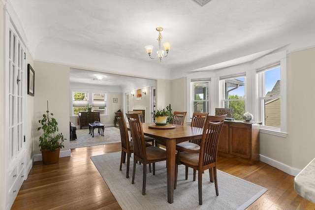 16 Field Rd Unit 16, Arlington, MA 02476 - dining room with a chandelier and light wood-style floors