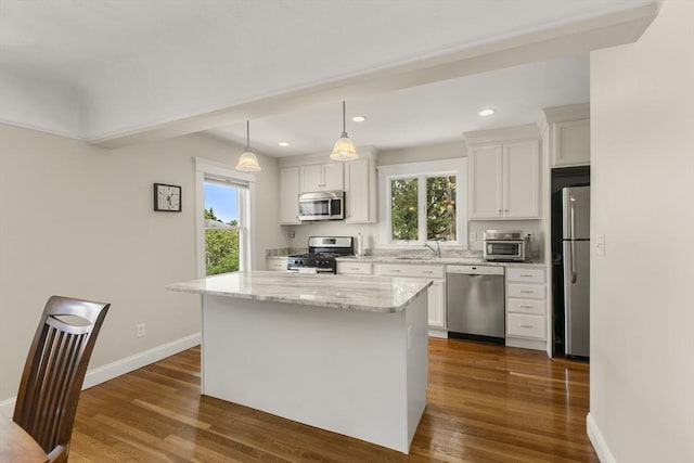 16 Field Rd Unit 16, Arlington, MA 02476 - kitchen with appliances with stainless steel finishes, white cabinetry, dark wood-type flooring, and recessed lighting