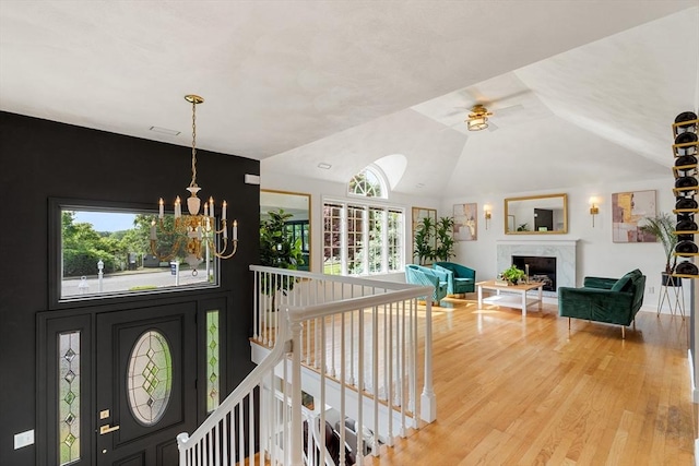 4 Blacksmith Way, Saugus, MA 01906 - foyer featuring a chandelier, healthy amount of natural light, light wood-style floors, a ceiling fan, and lofted ceiling