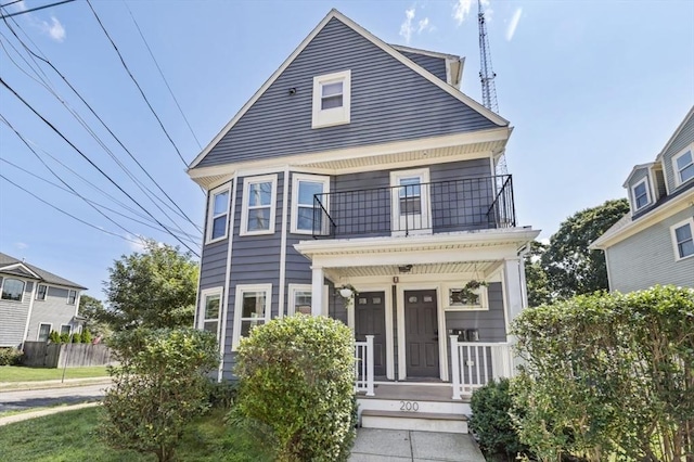 200 Elliot St Unit 1, Newton, MA 02464 - view of front of property with a balcony and a porch