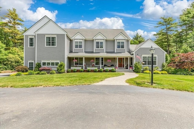 138 Saddleworth Way, Middleboro, MA 02346 - view of front of property featuring covered porch and a front yard
