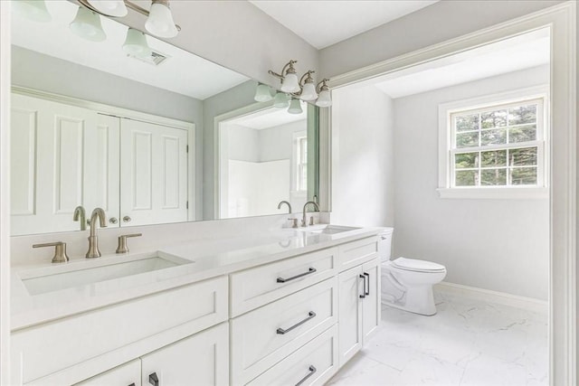 138 Saddleworth Way, Middleboro, MA 02346 - full bath with double vanity, toilet, marble look tile flooring, and baseboards