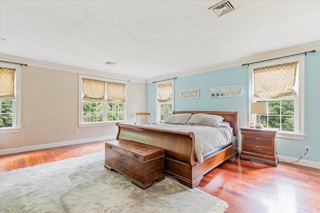 138 Saddleworth Way, Middleboro, MA 02346 - bedroom featuring ornamental molding, wood finished floors, and baseboards