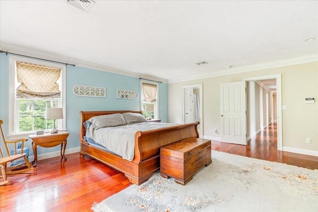 138 Saddleworth Way, Middleboro, MA 02346 - bedroom featuring ornamental molding, wood finished floors, and baseboards