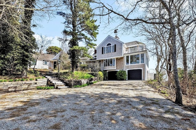 141 Daniels Island Rd, Mashpee, MA 02649 - shingle-style home with driveway, a garage, and stairway