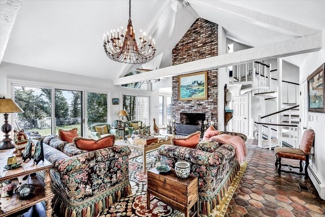141 Daniels Island Rd, Mashpee, MA 02649 - living area with a chandelier, high vaulted ceiling, beam ceiling, a brick fireplace, and stairs