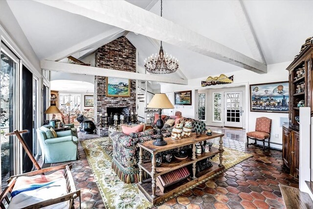 141 Daniels Island Rd, Mashpee, MA 02649 - living room with a chandelier, healthy amount of natural light, beamed ceiling, a brick fireplace, and high vaulted ceiling