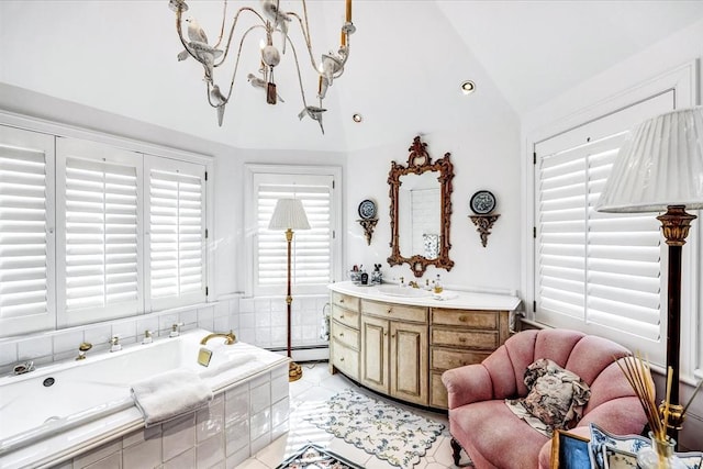 141 Daniels Island Rd, Mashpee, MA 02649 - bathroom with vaulted ceiling, vanity, a bath, tile patterned floors, and a baseboard heating unit