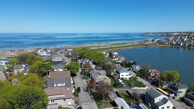birds eye view of property with a residential view and a water view