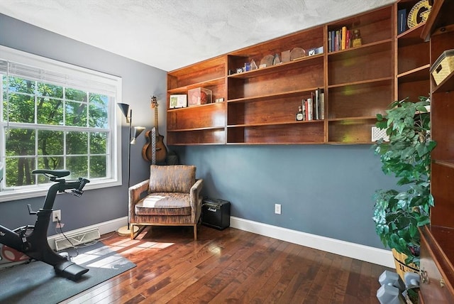 22 Dean St, Hudson, MA 01749 - living area featuring hardwood / wood-style flooring and baseboards