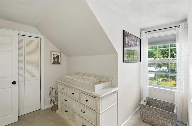 22 Dean St, Hudson, MA 01749 - bathroom featuring a closet, lofted ceiling, healthy amount of natural light, and vanity