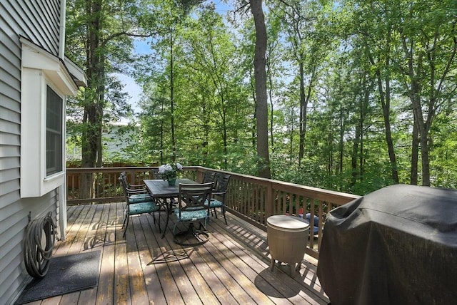 22 Dean St, Hudson, MA 01749 - wooden terrace with outdoor dining area and a grill