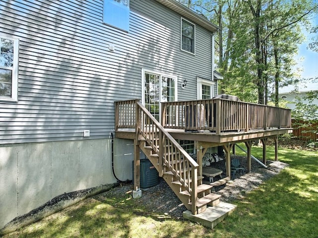 22 Dean St, Hudson, MA 01749 - back of house with a wooden deck, stairway, and a lawn