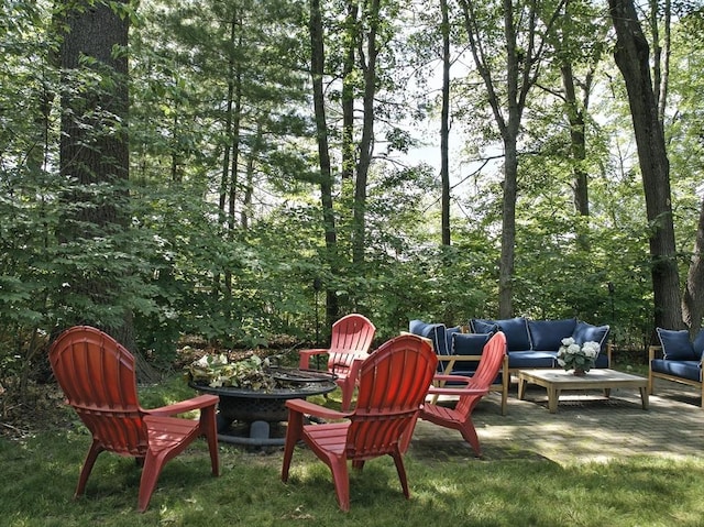 22 Dean St, Hudson, MA 01749 - view of yard featuring an outdoor living space with a fire pit and a patio area