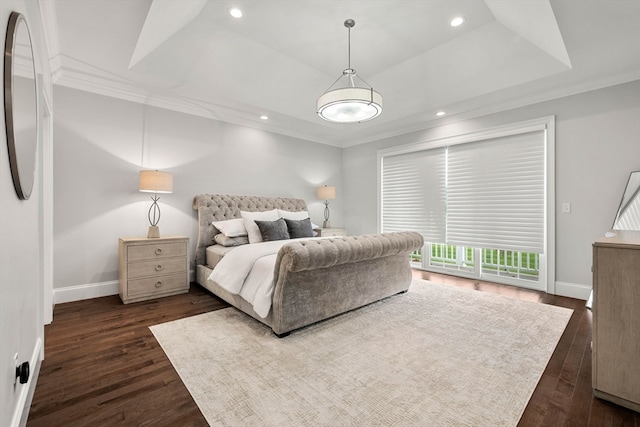 bedroom featuring ornamental molding and dark hardwood / wood-style flooring