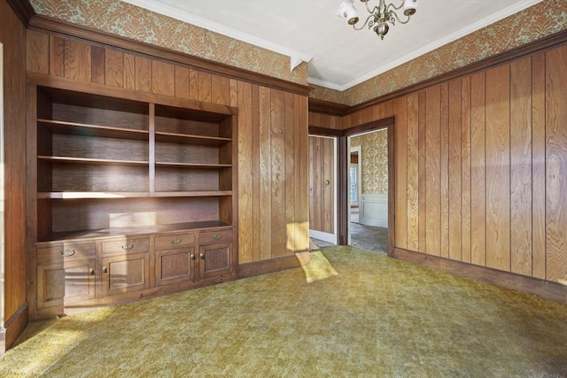 33 Burbank St, Millbury, MA 01527 - carpeted empty room with a chandelier, ornamental molding, and wooden walls