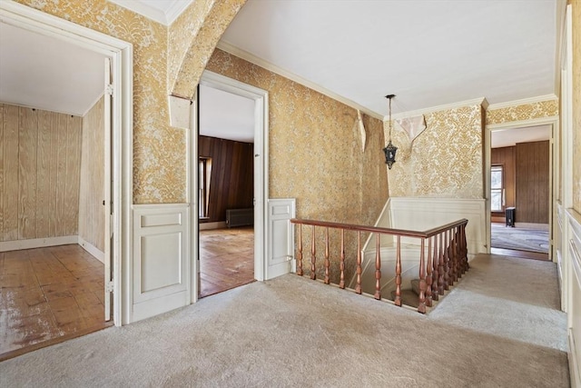 33 Burbank St, Millbury, MA 01527 - hallway with wallpapered walls, an upstairs landing, ornamental molding, wainscoting, and carpet