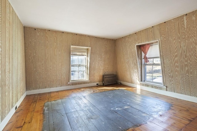 33 Burbank St, Millbury, MA 01527 - empty room featuring wood-type flooring and baseboards