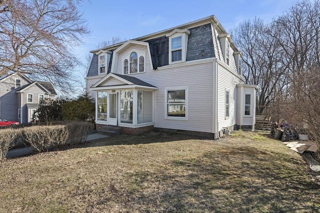 33 Burbank St, Millbury, MA 01527 - victorian home featuring mansard roof and a front yard