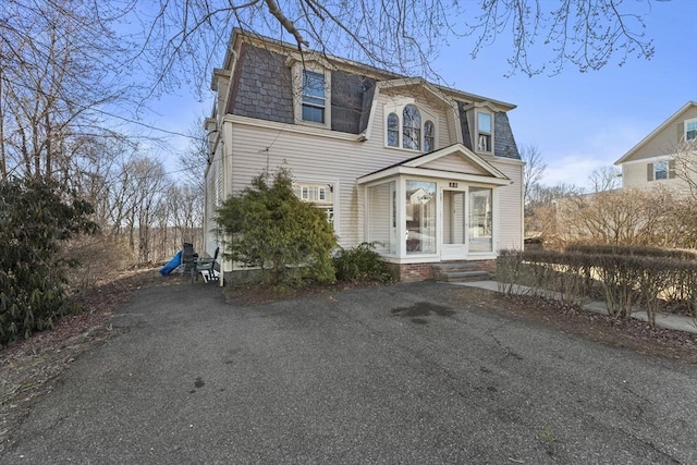 33 Burbank St, Millbury, MA 01527 - second empire-style home featuring mansard roof