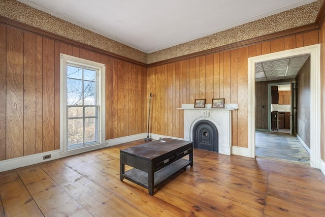 33 Burbank St, Millbury, MA 01527 - living room featuring a fireplace, hardwood / wood-style floors, and ornamental molding