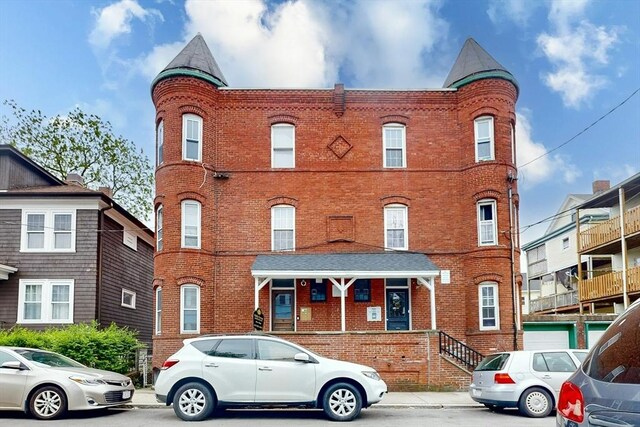 76 Belden St, Boston, MA 02125 - view of front of property featuring brick siding