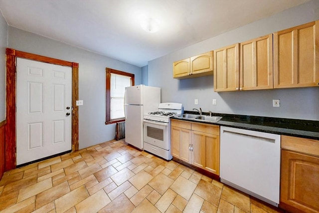 76 Belden St, Boston, MA 02125 - kitchen with white appliances, a sink, dark countertops, and light brown cabinetry
