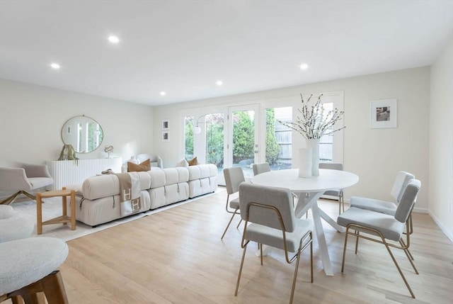 dining space featuring light hardwood / wood-style floors