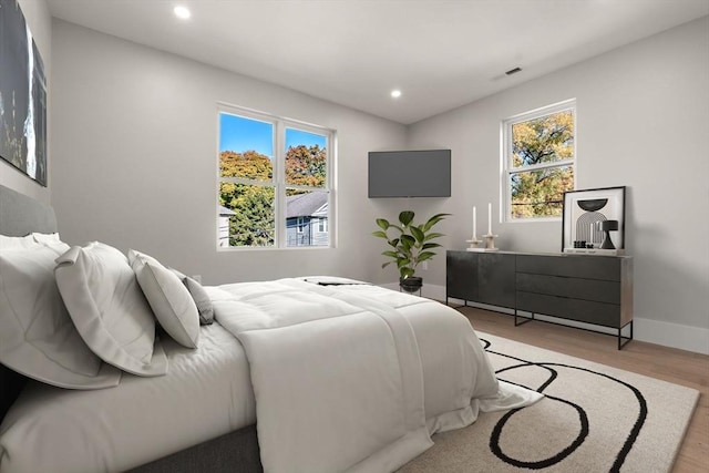 bedroom featuring light wood-type flooring