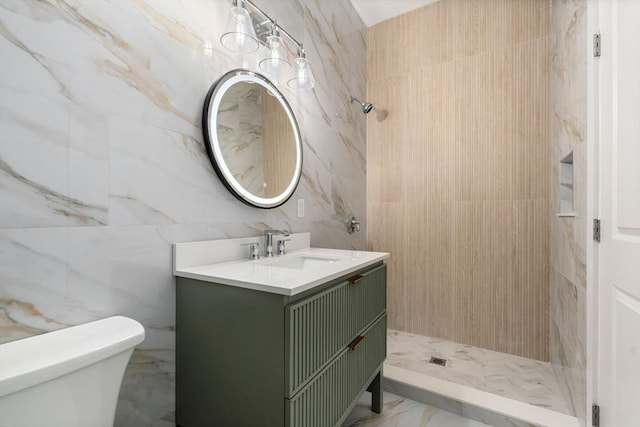 bathroom featuring vanity, toilet, and a shower