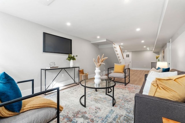 living room with light hardwood / wood-style flooring