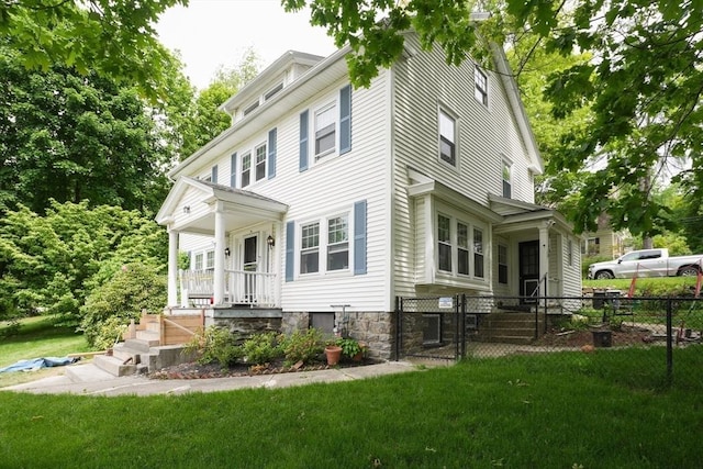 1013 Pleasant St, Worcester, MA 01602 - traditional style home featuring a porch and a gate