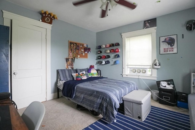 1013 Pleasant St, Worcester, MA 01602 - carpeted bedroom with a ceiling fan