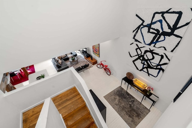 stairway featuring hardwood / wood-style floors