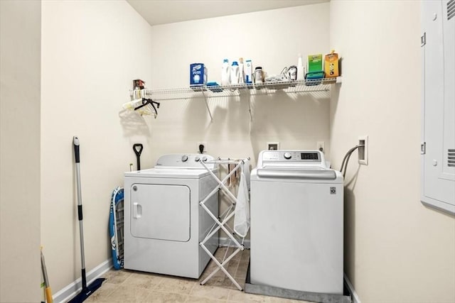 90 Trotter Rd Unit 309, Weymouth, MA 02190 - laundry area featuring washing machine and clothes dryer and light tile patterned floors