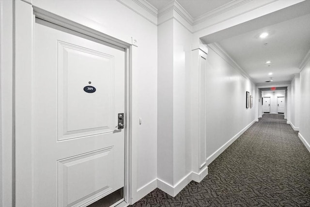 90 Trotter Rd Unit 309, Weymouth, MA 02190 - corridor with dark carpet, ornamental molding, and recessed lighting