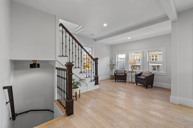 entrance foyer featuring light hardwood / wood-style floors and a wealth of natural light