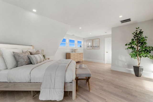 bedroom featuring light hardwood / wood-style floors