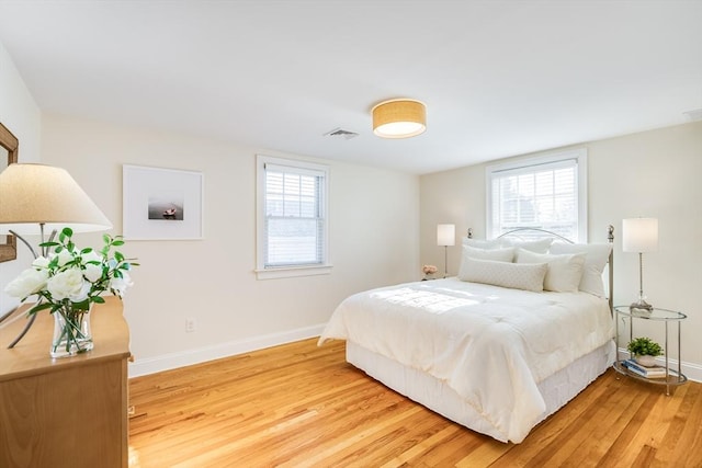 bedroom featuring hardwood / wood-style flooring