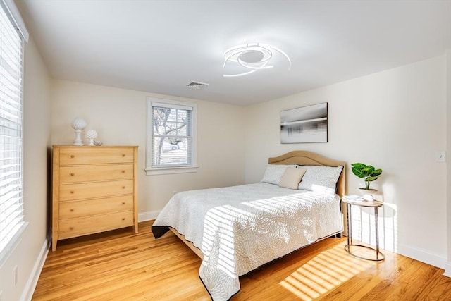 bedroom featuring hardwood / wood-style floors