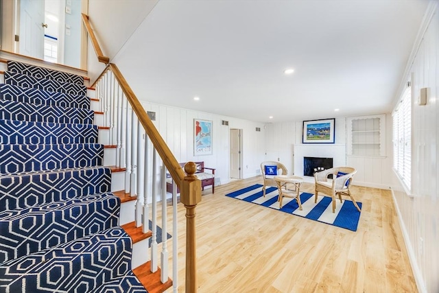 interior space with light hardwood / wood-style flooring and a fireplace